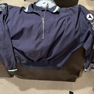Mens 3/4 zip over the head golf wind breaker jacket.